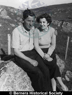 Mr & Mrs Bill Eadie sitting on a rock