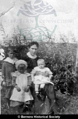 Annie MacLeod with three of her children