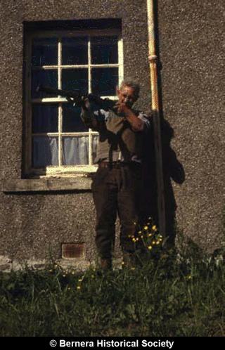 D C Macdonald, 11 Kirkibost with rifle