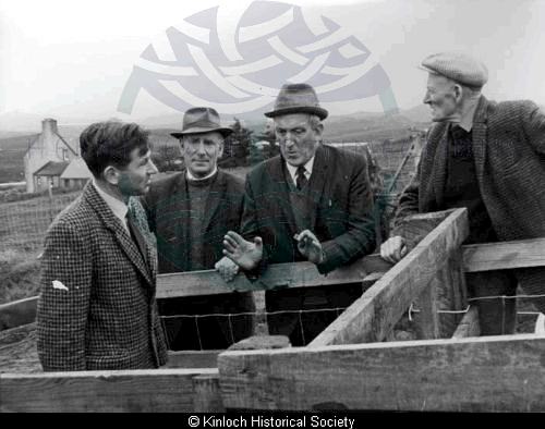 Alex Buchanan Smith, Secretary of State for Scotland chatting to two men from Laxay at a sheep fank