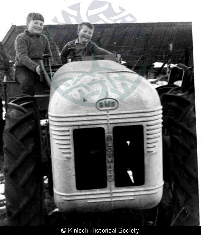 Boys on Plotmate tractor